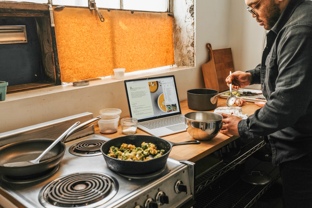Men reviewing nutrition education materials and meal planning